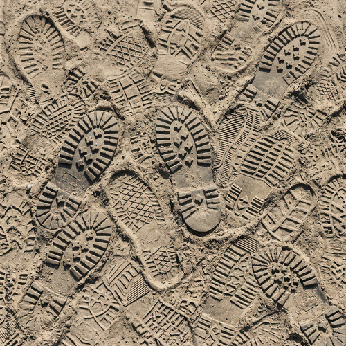 Footprints In The Sand Many Different Shoe Impressions
