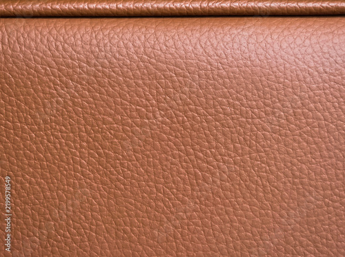 Natural Brown Leather Texture Close Up. Detailed Tan Leather Surface Background with Rich Grain, Soft Warm Tones and Luxury Upholstery Material. Furniture, Fashion, Interior Design, Premium Branding