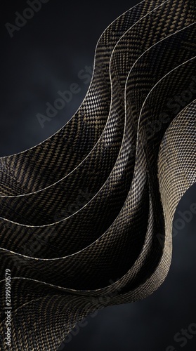 Kevlar fiber weave in smooth curved patterns on a dark background  
