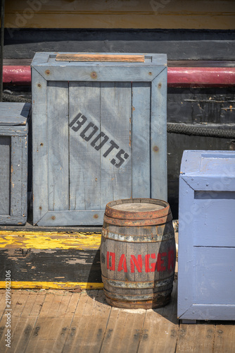Fotografie Shipboard Supply Crates and Storage Barrel