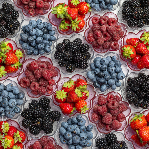 Mixed Berries In A Square Flat Lay On A Light Background. Blueberries Blackberries Raspberries And Strawberries Top View. Vivid Fruit Pattern