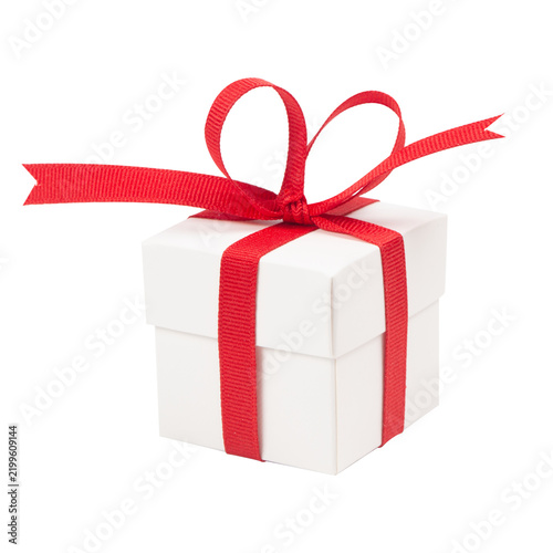 Small white present box wrapped with a red ribbon and bow, isolated transparent background. Perfect for Christmas, birthdays, Valentine's Day, or holiday gift design.