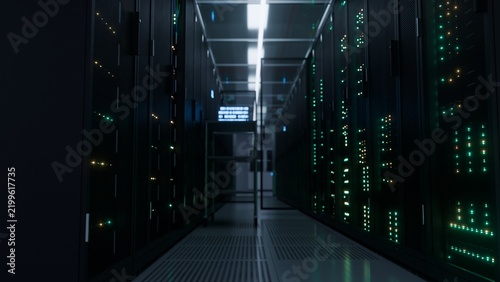 Empty server aisle lined with racks and glowing green indicator lights in a dark modern data center corridor ideal for cloud hosting cybersecurity and