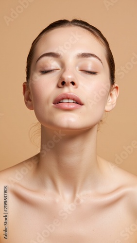 Relaxed Beauty Portrait on Soft Beige Background