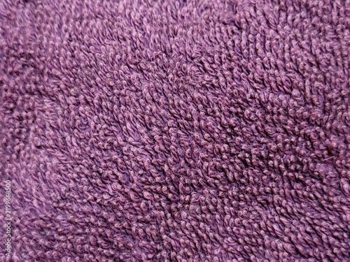 Purple terrycloth towel texture macro background
