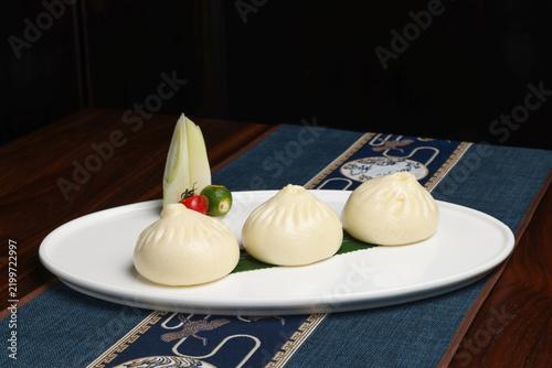 Three Large Steamed Pork Buns, Elegant Traditional Chinese Food Presentation