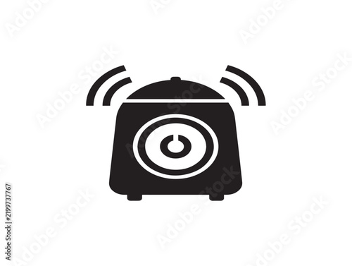 Black alarm icon with sound waves isolated on a white background