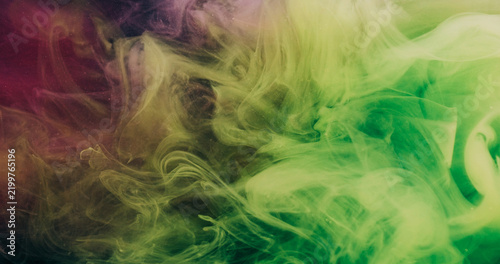 Haze splash. Underwater ink drop. Defocused green color glitter spreading cloud water vibrant acrylic art fluid on abstract background.
