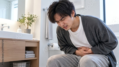 Plakat 腹痛に苦しむアジア人男性01