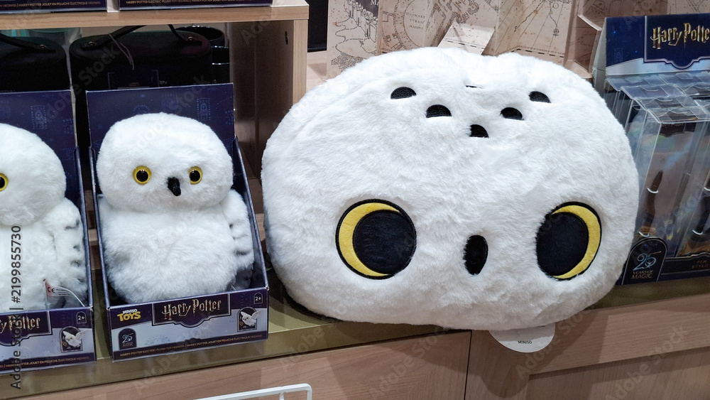 Fototapeta premium Miniso Harry Potter Hedwig owl head plush cushion and toy box on retail display shelf on September 16, 2026 in Bangkok, Thailand 