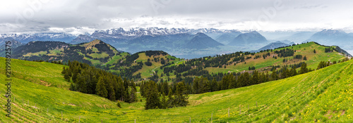 Bild auf Leinwand Scenic panoramic view of Mount Rigi in the Swiss Alps during early summer