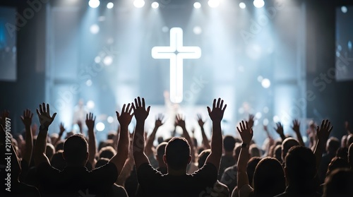 Christian worship concert with glowing cross, crowd raising hands in praise, modern church service with stage lighting and spiritual atmosphere