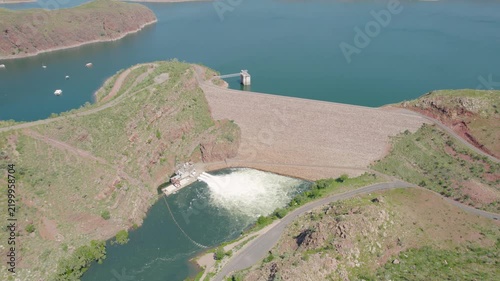 Dam Wall With Water And Boats On The Reservoir Near Kununurra