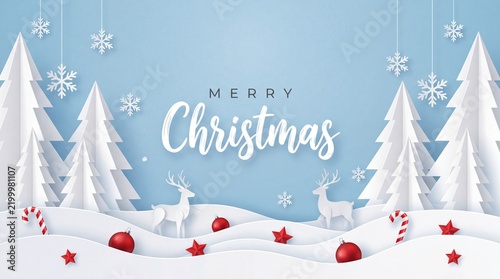 Merry Christmas paper cutout illustration featuring snowflakes, reindeer, red ornaments, and white trees on a blue background