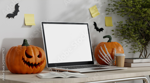 3D rendering of Laptop Mockup on Desk with Halloween Decor and Carved Pumpkins