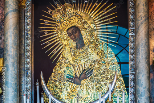 Golden icon of Our Lady of the Gate of Dawn Virgin Mary in Vilnius chapel