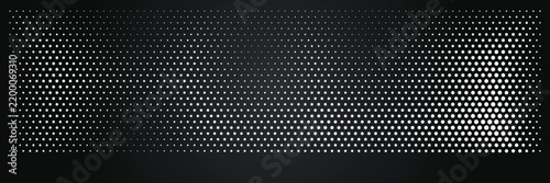 Abstract halftone pattern background with gradient dots in black and white