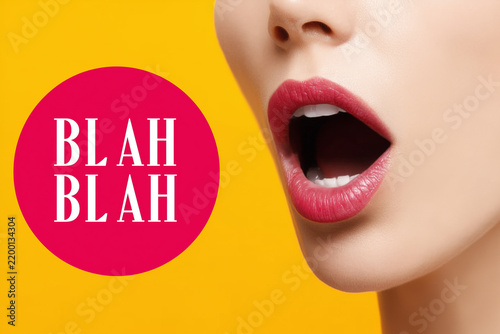 Woman mouth close up on vivid background with BLAH BLAH text