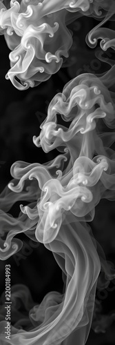 Swirling gray smoke vapor forms intricate shapes, diffused, translucent
