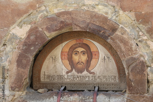 Fresh Image of Christ Icon Fresco in Stone Archway Niche at Ancient Georgian Monastery