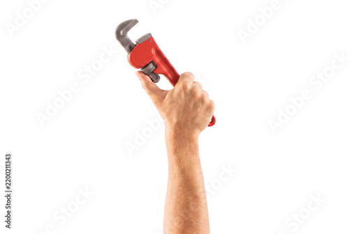 Hand Holding Red Pipe Wrench Reaching Upwards