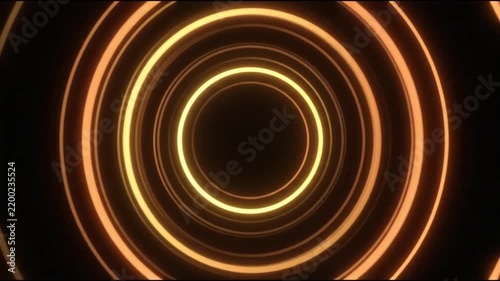 Abstract neon glowing circular tunnel background loop with orange and yellow light rings.