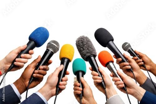 Diverse microphones for media coverage.