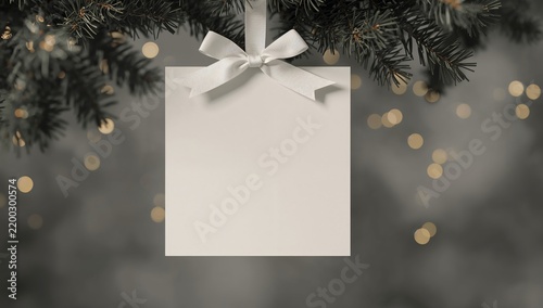 Blank Gift Tag Hanging on Festive Tree Branch With Background Lights
