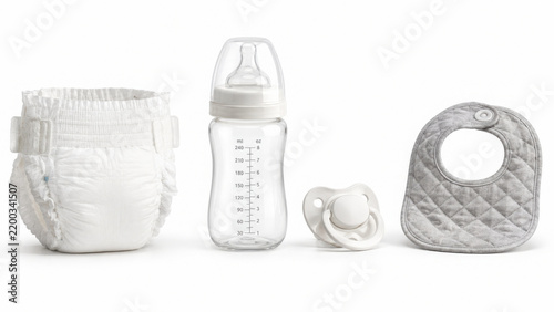Baby care essentials set with diaper feeding bottle pacifier bib