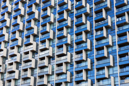 Geometric architectural facade of a modern high rise residential building