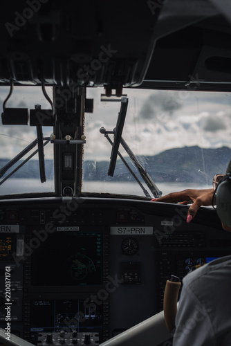 Black female pilot flying a small passenger plane in Seychelles