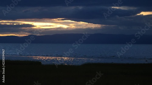 Coucher de soleil sur le fleuve Saint-Laurent, La Pocatière, Québec, Canada.