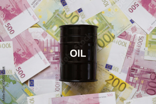 Black oil barrel on euro banknotes