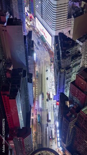 night time illumination hong kong city famous traffic street road circle crossroad aerial vertical panorama 4k timelapse   
