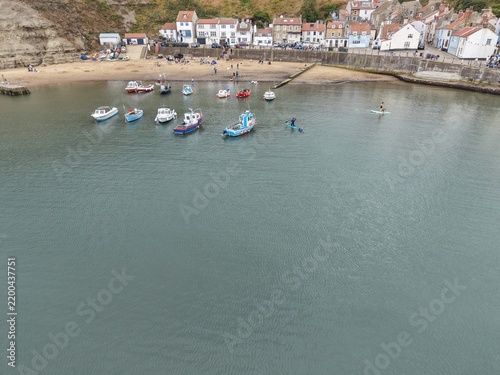 aerial view of Staithes fishing port in the borough of Scarborough in North Yorkshire, England