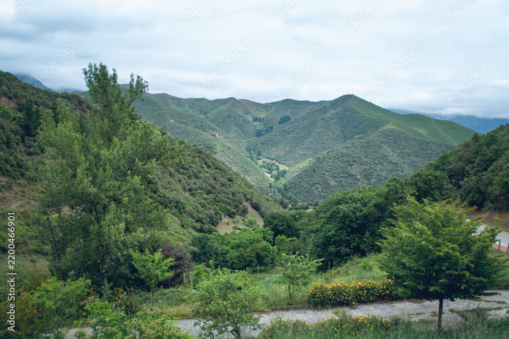 Obraz premium Mountain landscape and green valley from San Miguel Viewpoint in Cantabria