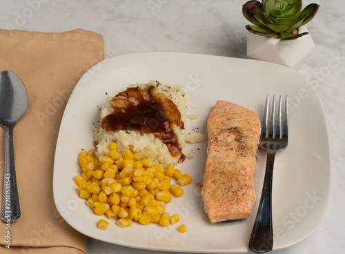 Obraz na płótnie seasoned salmon with mashed potatoes and corn