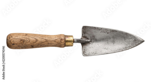 Quadro su tela Vintage garden trowel with a weathered wooden handle and a tarnished metal blade