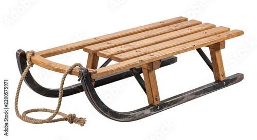 Obraz na plátně Classic wooden sled with metal runners and a rope handle, isolated on a clean wh