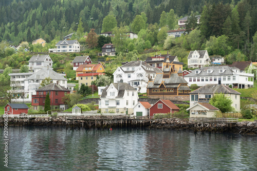 Village on fjord coast Norway with houses