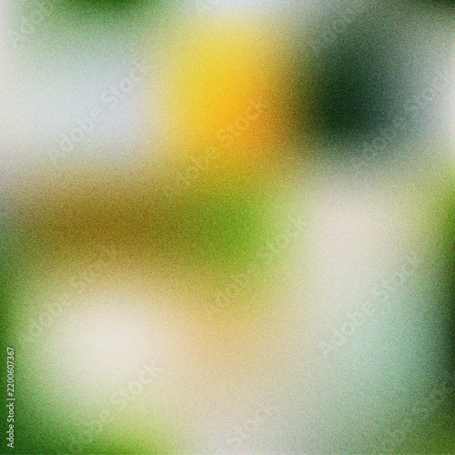 Abstract blurred background texture featuring various shades of natural green and bright yellow colors