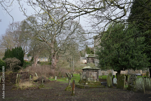 Obraz na plátne Stanhope Churchyard With Gravestones and Winter Trees
