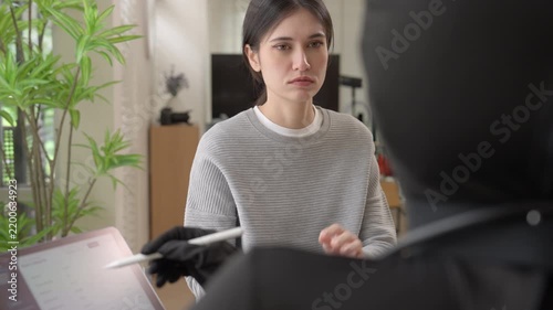 AI healthcare assistant consulting with a patient, representing artificial intelligence, digital health, medical technology, human-AI collaboration and the future of patient-centered healthcare.