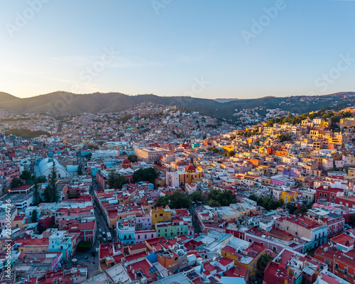 Obraz na plátně Aerial panoramic view of colorful hillside houses and historic colonial town at