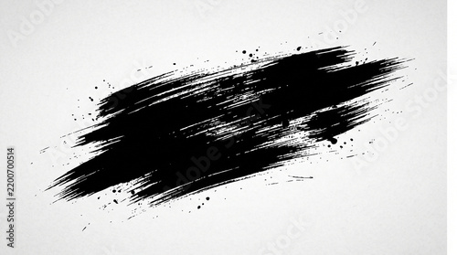 Black paint brush stroke isolated on a white background with texture