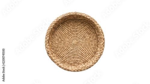Top view of a round woven wicker basket made of natural seagrass, isolated on transparent background