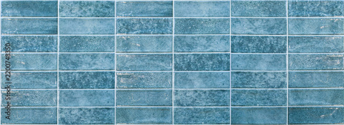 Blue ceramic tile wall texture background as seamless pattern for kitchen and bathroom design