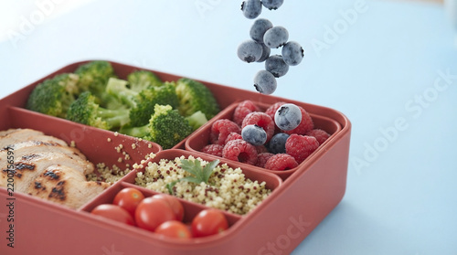 Healthy Lunchbox Meal Prep: Fresh Fruits, Vegetables, Grilled Chicken, Quinoa, and Vibrant Colors for Clean Eating and Portion Control