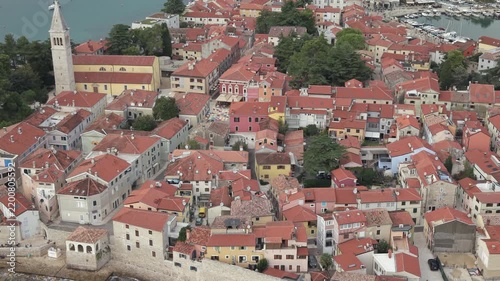 Aerial view of terracotta rooftops bell tower and medieval streets in Novigrad Istria Croatia