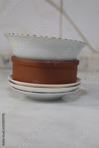 Stack of white plates and bowls